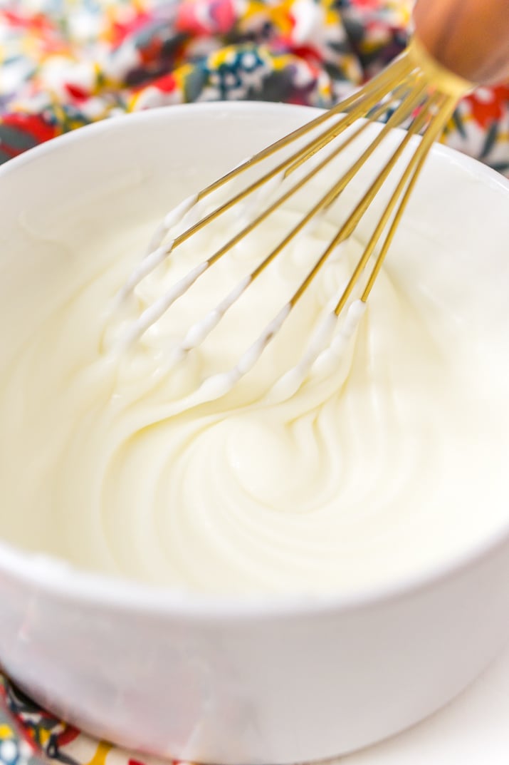 This really is the best homemade vanilla icing recipe! It's perfect for slathering on cinnamon rolls and drizzling over cakes and cookies!