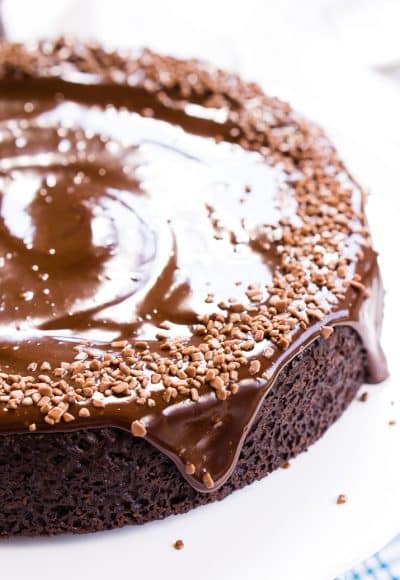 This Chocolate Wacky Cake is a delicious old fashioned one-pan chocolate cake that contains no eggs, butter, or milk! It's totally wacky and vegan too!