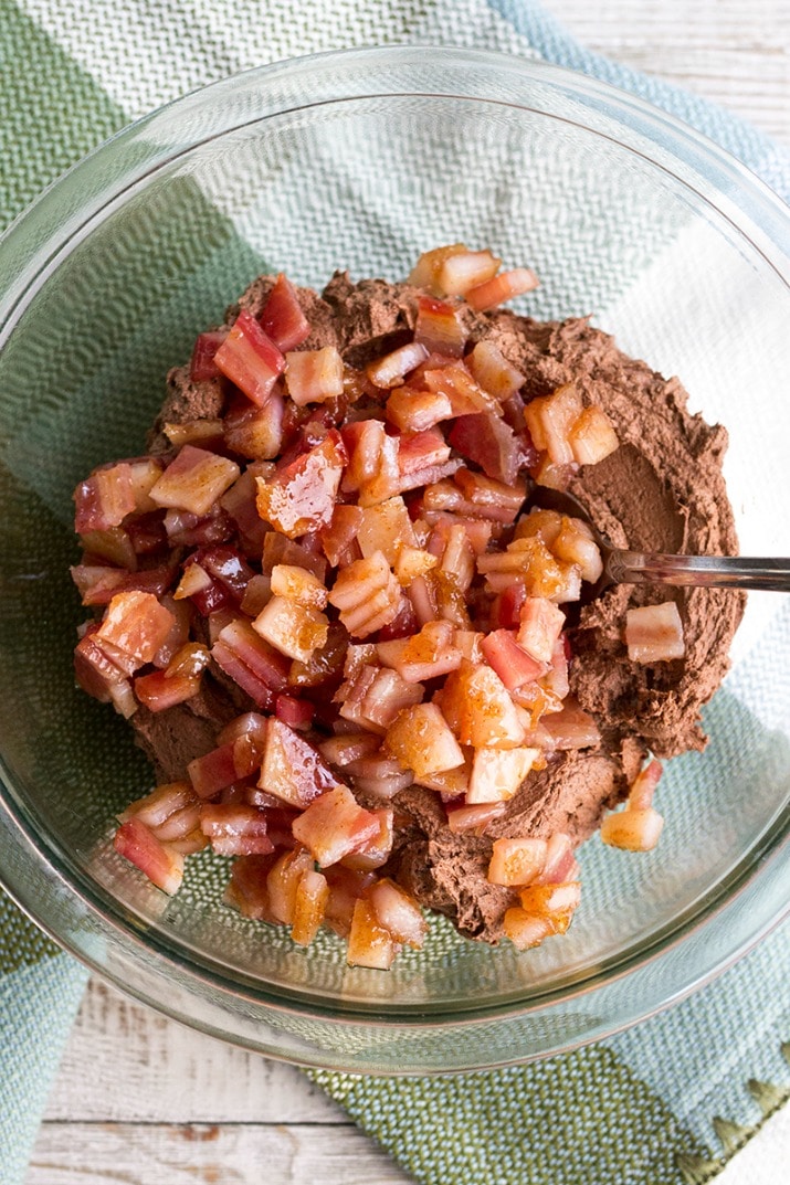 Brown Sugar Bacon Chocolate Cake is a decadent dessert layered with rich chocolate and candied bacon. 