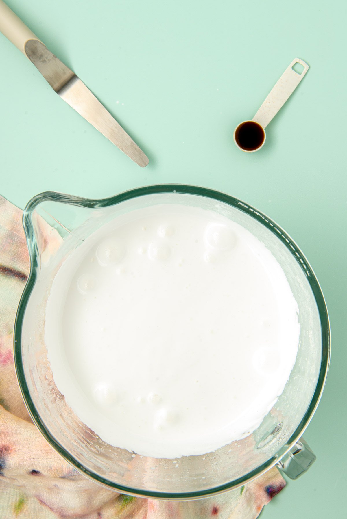 Marshmallow cream in a glass mixing bowl.