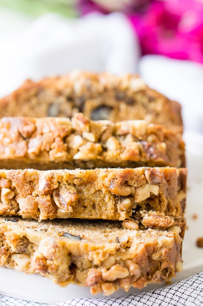 This Spiced Pumpkin Bread Recipe is loaded with amazing spices and chopped walnuts, it's the perfect quick bread for fall!