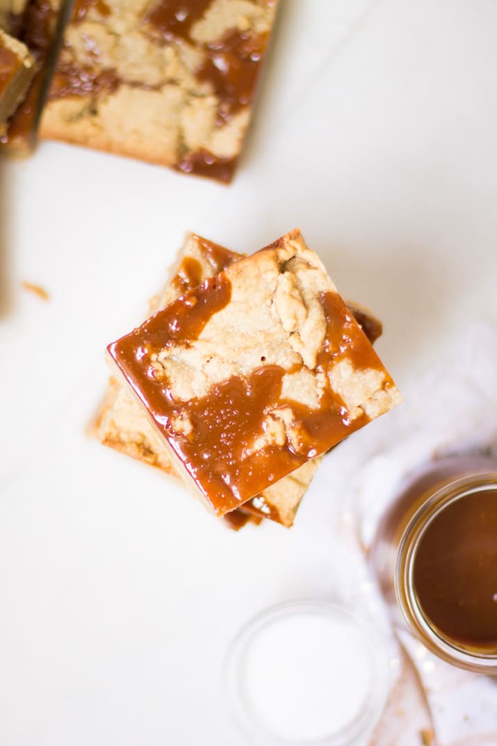 These Easy Salted Caramel Blondies, with layers of sweet vanilla and rich salted caramel flavor, are the epitome of decadence and the perfect dessert to make as we transition into fall!