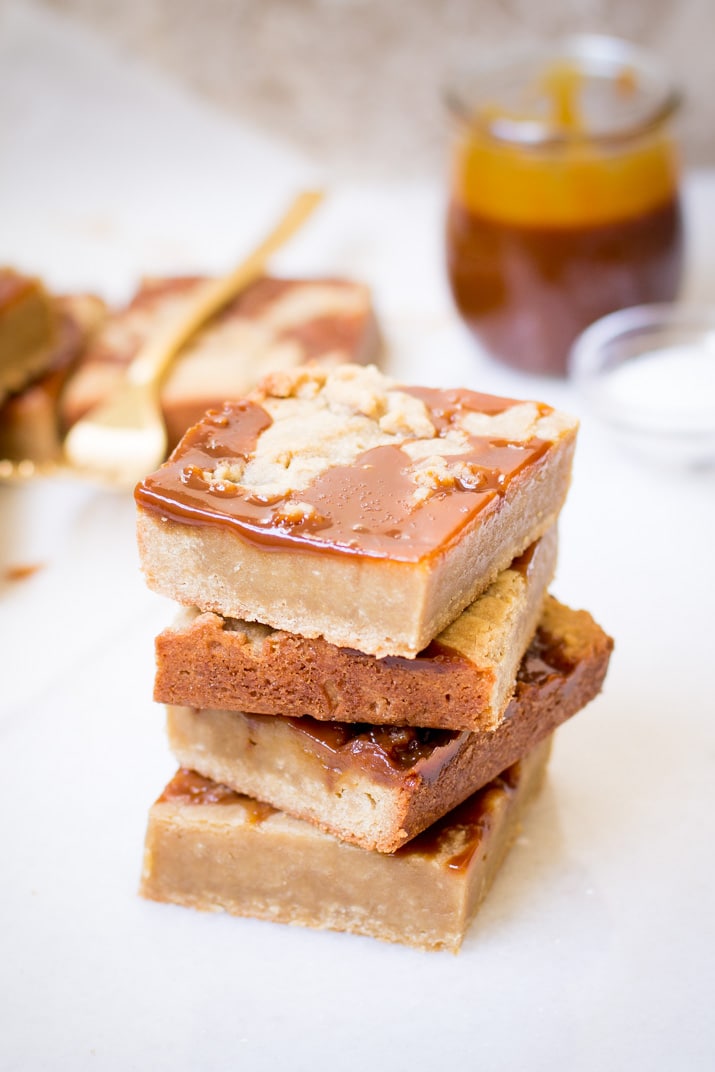 These Easy Salted Caramel Blondies, with layers of sweet vanilla and rich salted caramel flavor, are the epitome of decadence and the perfect dessert to make as we transition into fall!