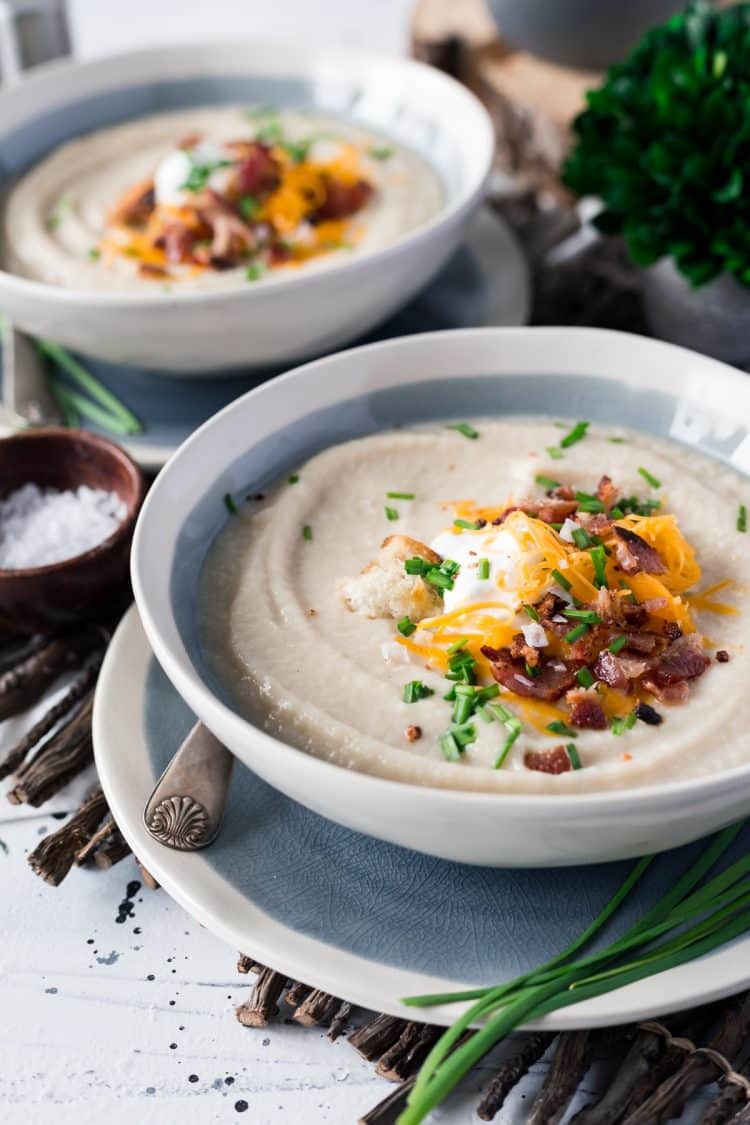  This Loaded Cauliflower Soup is creamy and delicious! It's made with fresh cauliflower, sweet onion, and topped with crispy bacon, cheddar cheese, and sour cream for a healthy meal option.
