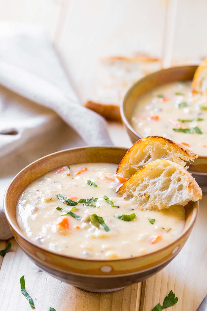 Creamy Wild Rice Soup is the perfect slow cooker soup for cold winter nights and loaded with a wild rice blend fresh, carrots, and celery.