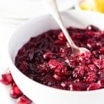 This Bourbon Orange Cranberry Sauce is loaded with tart and zesty flavor! Made with fresh cranberries, orange juice, orange zest, and bourbon on the stove and ready in less than 30 minutes.