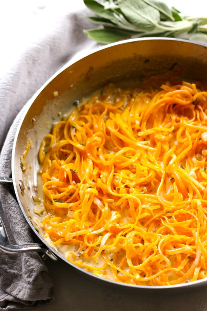 These Butternut Squash Noodles with Sage Cream Sauce are creamy, crunchy, and earthy! It's a super versatile meal - Add a protein of your choice, eat it as a side, or keep it vegetarian.