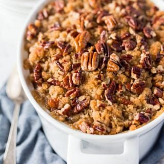 This Sweet Potato Casserole is loaded with rich and cozy flavors of brown sugar, cinnamon, and nutmeg. It's laced with butter and crunchy pecans, the perfect holiday side dish!