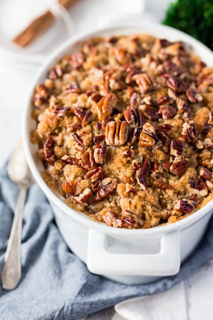 This Sweet Potato Casserole is loaded with rich and cozy flavors of brown sugar, cinnamon, and nutmeg. It's laced with butter and crunchy pecans, the perfect holiday side dish!