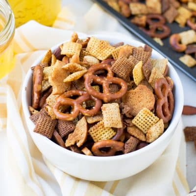 Crunchy, buttery and full of flavor this easy crunchy party mix is the perfect snack for holiday entertaining!