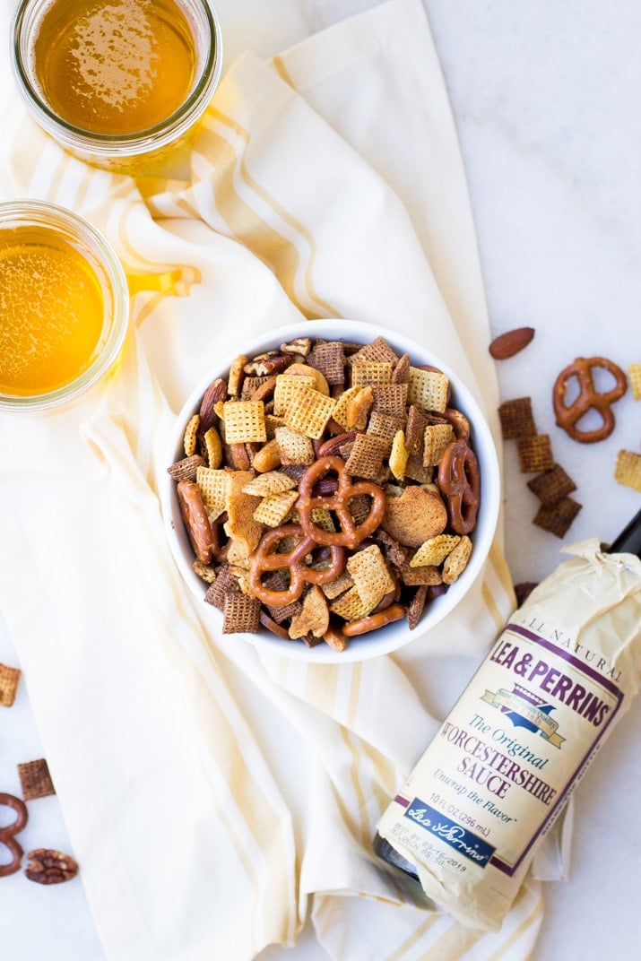 Crunchy, buttery and full of flavor this easy crunchy party mix is the perfect snack for holiday entertaining!