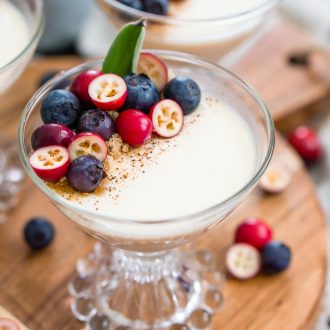 This Maple Panna Cotta is a light and creamy fall dessert that's simple to make and impressive to serve holiday dinner guests!