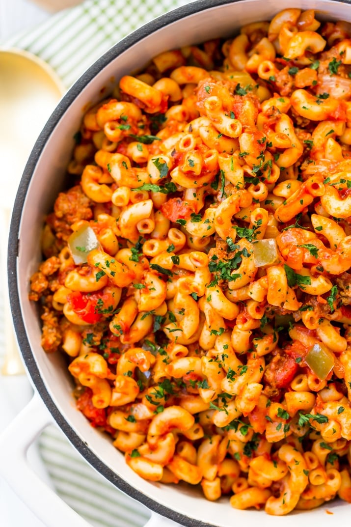 Classic American Chop Suey Recipe made with pasta, beef, pepper, onions, and tomatoes.