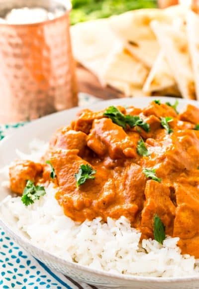 This Easy Chicken Tikka Masala Recipe is a delicious British Indian recipe made with a rich and creamy tomato curry sauce loaded with bold spices and chicken.