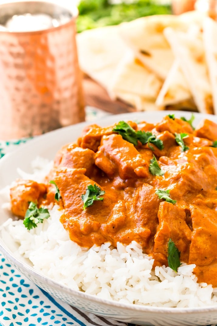 This Easy Chicken Tikka Masala Recipe is a delicious British Indian recipe made with a rich and creamy tomato curry sauce loaded with bold spices and chicken.