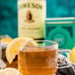 This Hot Toddy recipe is a cold remedy you can mix up at home with simple ingredients that will soothe a sore throat, reduce congestion, and aid sleep. A mixed drink recipe made with lemon, honey, whiskey, and tea.