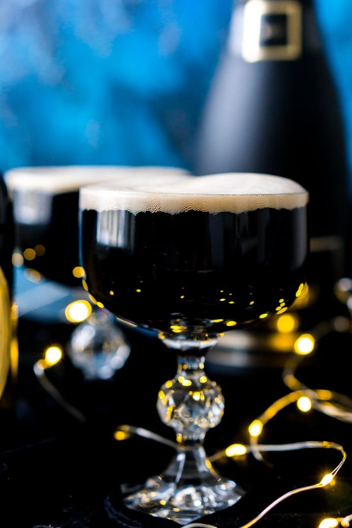 This Guinness and Champagne Black Velvet Cocktail is a deliciously easy drink made with stout and bubbly! The best quick cocktail for New Year's Eve, St. Patrick's Day, or just because!