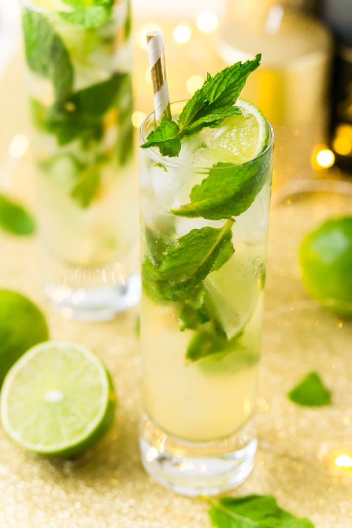 This Champagne Mojito Recipe is a bubbly twist on the classic cocktail making it perfect for parties and celebrations. Made with fresh limes, mint, simple syrup, rum, and champagne, everyone will love this zesty and refreshing cocktail!