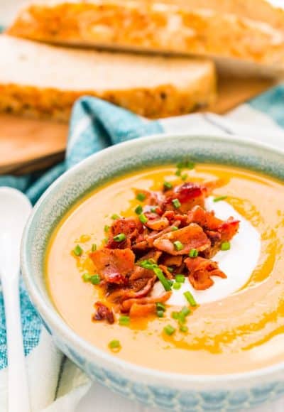 This Sweet Potato Soup is a creamy and filling dinner recipe that's made on the stovetop with onion, sweet potatoes, cream, stock, garlic, and spices! A comforting soup recipe for special occasions or chilly nights!