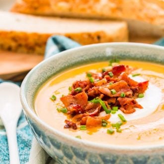 This Sweet Potato Soup is a creamy and filling dinner recipe that's made on the stovetop with onion, sweet potatoes, cream, stock, garlic, and spices! A comforting soup recipe for special occasions or chilly nights!