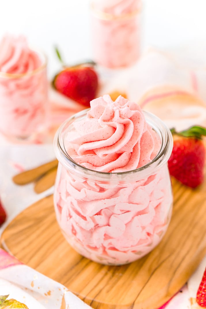 Easy Strawberry Frosting made with heavy cream, powdered sugar, and jello mix.