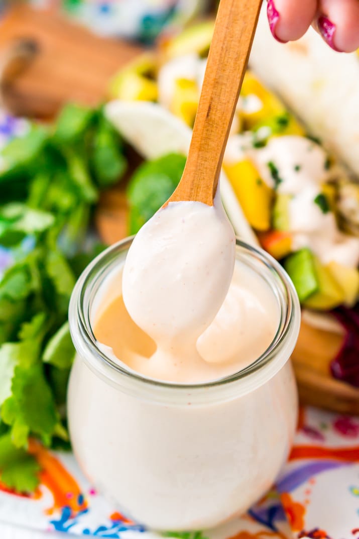 This sauce is the ultimate topping for fish tacos. It's a creamy a delicious blend of sour cream, mayonnaise, lime juice, sriracha, garlic, and cumin.