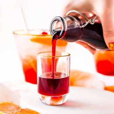 This recipe for Grenadine Syrup allows you to make this fresh and flavorful cocktail syrup right at home. Made with pomegranate juice, sugar, and lemon juice, it's ready to use in about 30 minutes and tastes so much better than that store-bought stuff!
