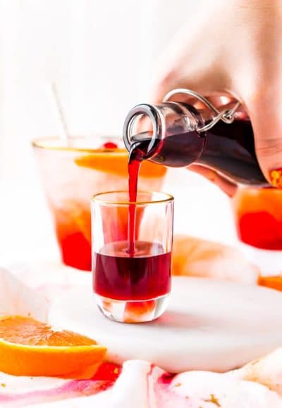 This recipe for Grenadine Syrup allows you to make this fresh and flavorful cocktail syrup right at home. Made with pomegranate juice, sugar, and lemon juice, it's ready to use in about 30 minutes and tastes so much better than that store-bought stuff!