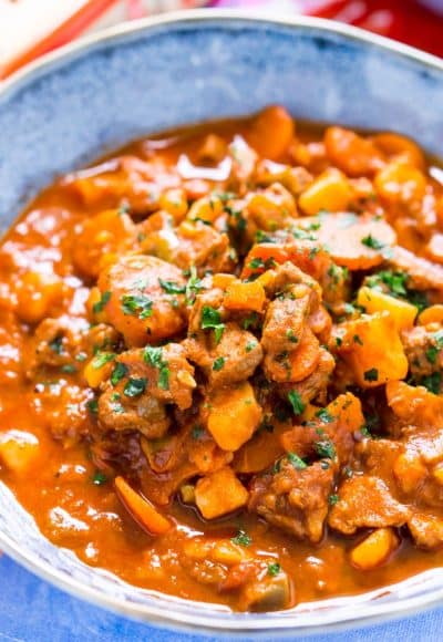 This Hungarian Goulash recipe is a rich and hearty dinner loaded with beef, carrots, potatoes, sweet paprika, and more. An easy stew recipe that reheats well and tastes delicious!