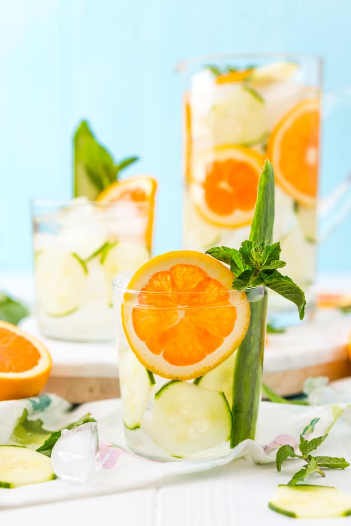 Add mint and oranges to cucumber water for a delicious and refreshing drink!