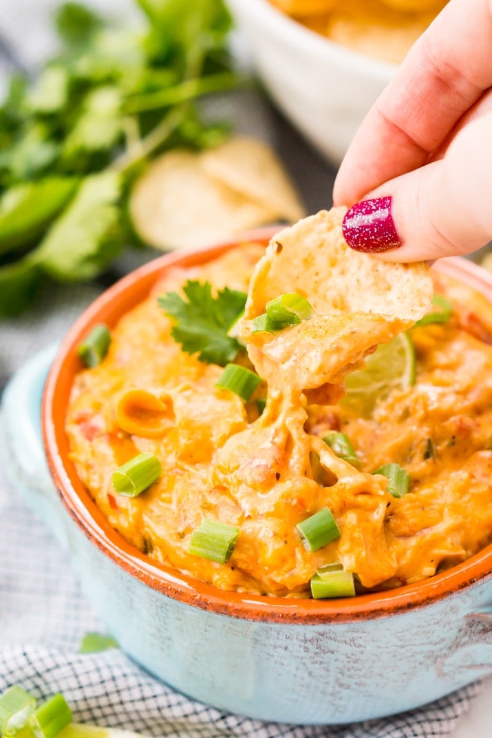Easy and delicious chicken queso dip recipe made in a slow cooker!