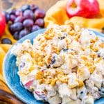 This Apple Grape Salad is a vintage dessert salad made with cream cheese, yogurt, apples, grapes, walnuts, and sugar! It's a potluck favorite and everyone will want the recipe!