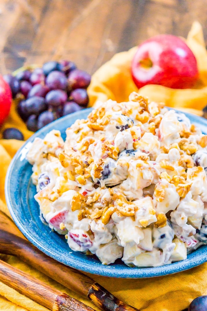 This Apple Grape Salad is a vintage dessert salad made with cream cheese, yogurt, apples, grapes, walnuts, and sugar! It's a potluck favorite and everyone will want the recipe!