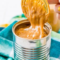 This Dulce de leche recipe is made with 1 ingredient in the slow cooker! It's a super easy recipe to make and the results are a rich and sticky golden sauce you'll want to put on everything!