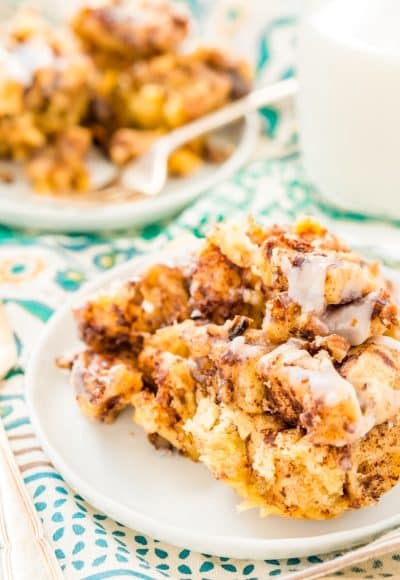 This Slow Cooker Cinnamon Roll Casserole is the perfect lazy breakfast for weekends and holidays! An easy and delicious sweet breakfast treat that's loaded with cinnamon, maple, pecans, and more!