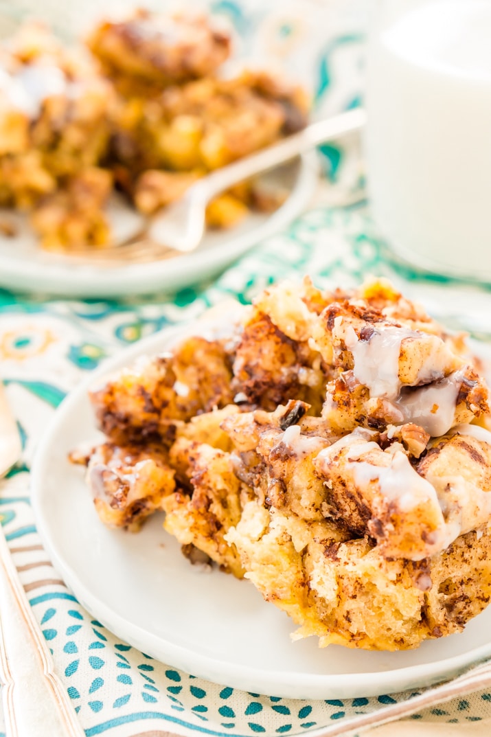 Slice of Cinnamon Roll Casserole on white plate