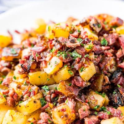 This Corned Beef Hash is a salty and delicious breakfast dish the whole family will love! A simple hash made with brisket, potatoes, onions, butter, thyme, and pepper and a great way to use up leftover Corned Beef!