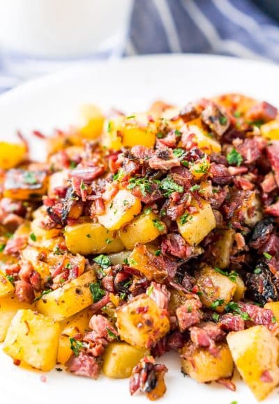 This Corned Beef Hash is a salty and delicious breakfast dish the whole family will love! A simple hash made with brisket, potatoes, onions, butter, thyme, and pepper and a great way to use up leftover Corned Beef!