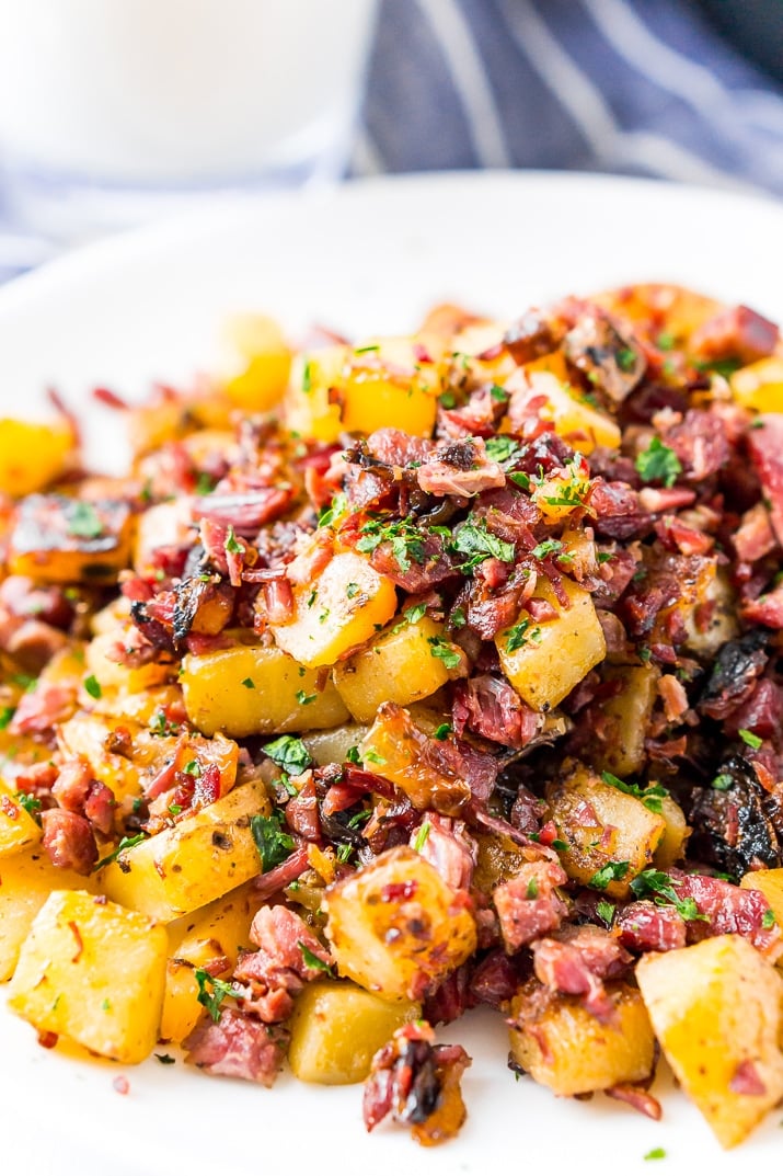 This Corned Beef Hash is a salty and delicious breakfast dish the whole family will love! A simple hash made with brisket, potatoes, onions, butter, thyme, and pepper and a great way to use up leftover Corned Beef!