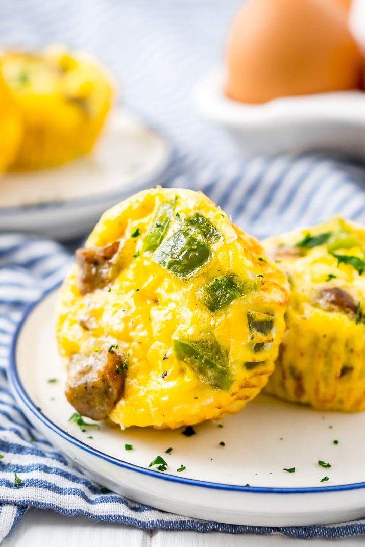 This Crustless Mini Quiche Recipe made with eggs, sausage, green peppers, and cheese are perfect for quick weekday breakfasts or weekend brunch! Make them ahead of time and freeze them for when you want them!