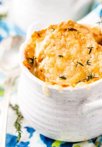 French Onion Soup is a classic dish made with caramelized onions, beef broth, and spices. Topped with crusty French Bread and a layer of melted Gruyère cheese, it’s sophisticated enough for a dinner party but comforting enough for a cozy night in!