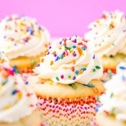 These Birthday Cupcakes are a delicious and fluffy vanilla almond cake that's loaded with sprinkles and topped with an easy and addictive whipped frosting!