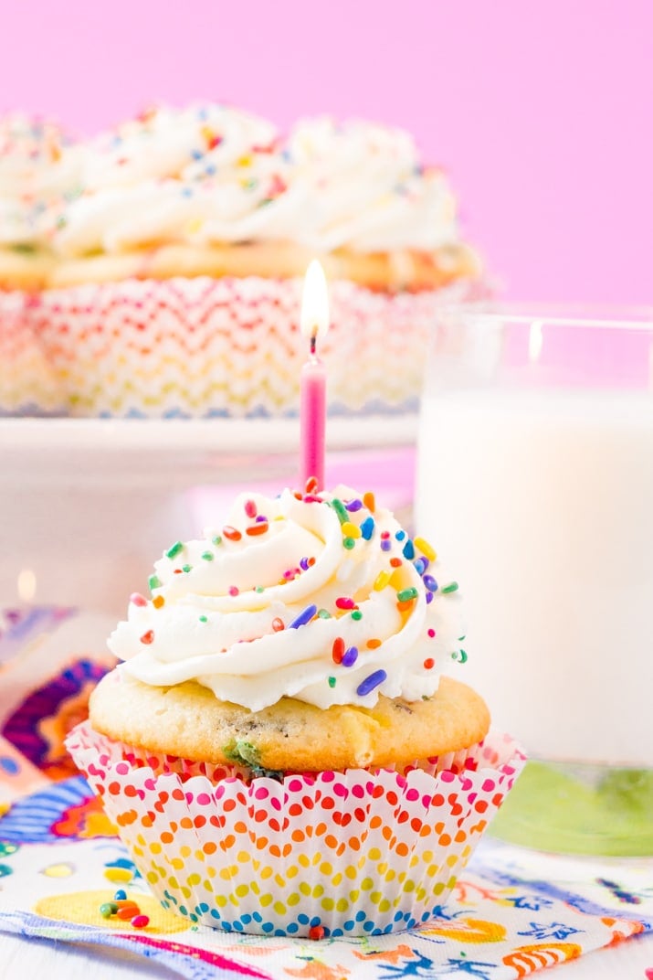 These Birthday Cupcakes are a delicious and fluffy vanilla almond cake that's loaded with sprinkles and topped with an easy and addictive whipped frosting!