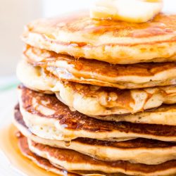The Best Homemade Buttermilk Pancakes are the perfect weekend breakfast! They're made from scratch and super fluffy and buttery and delicious! Just top with butter and syrup and you're golden!