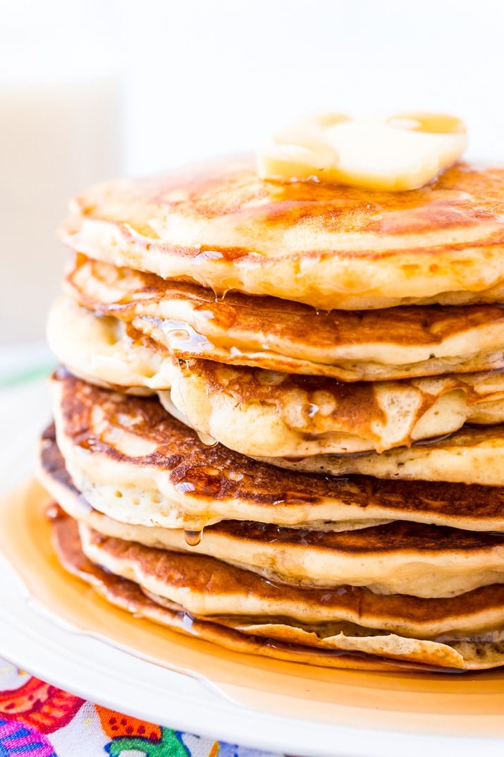 Maple Syrup dripping off Buttermilk Pancakes