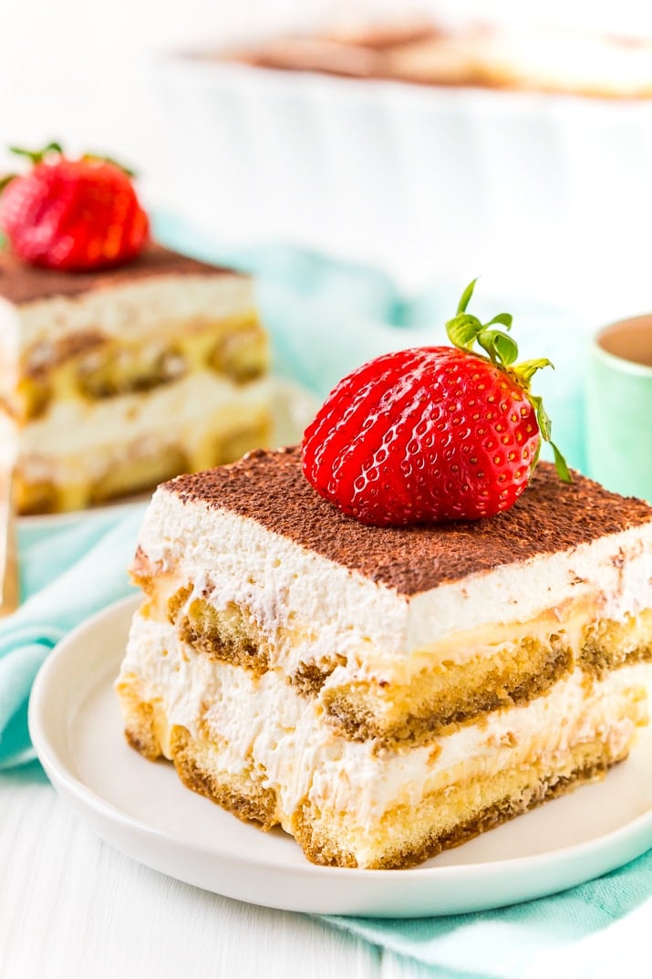 This Boozy Tiramisu recipe swaps out traditional coffee for a rich coffee liqueur. It's a shortcut version made with mascarpone laced pudding instead of a traditional egg custard. Topped with a silky vanilla whipped cream.