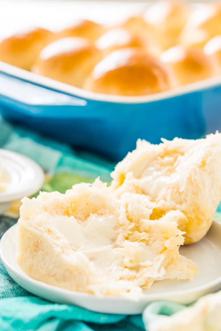 Yeast rolls with butter on a small plate