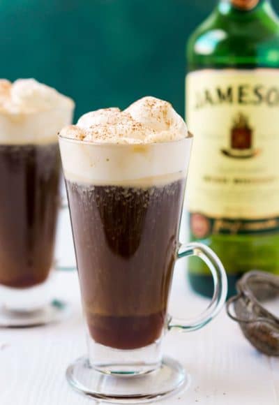 This Irish Coffee recipe is a traditional drink recipe made with coffee, whiskey, sugar, brown sugar, and whipped cream. A spiked coffee for weekends and dessert.