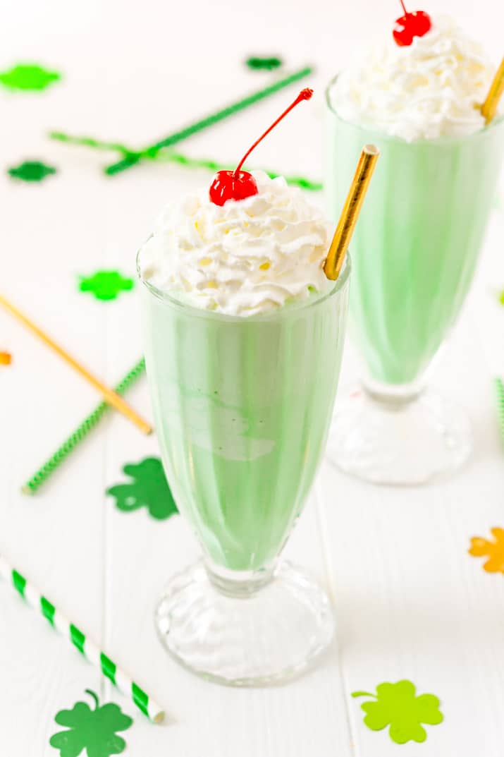 This Shamrock Shake is a McDonald's Copycat recipe that tastes just like the real thing! A thick and sweet vanilla mint shake for St. Patrick's Day!