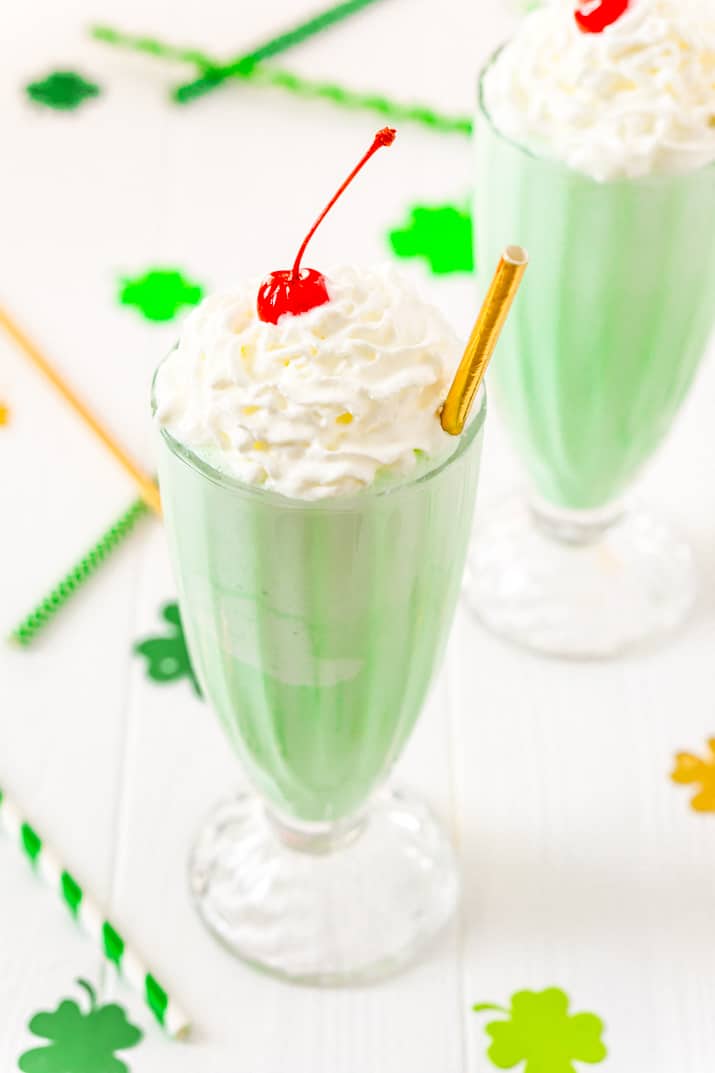 This Shamrock Shake is a McDonald's Copycat recipe that tastes just like the real thing! A thick and sweet vanilla mint shake for St. Patrick's Day!